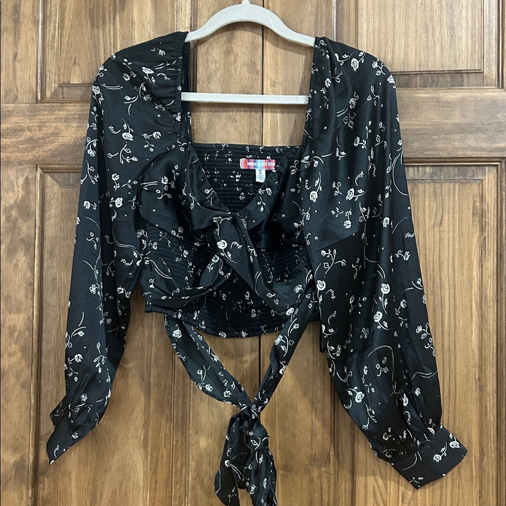 Urban outfitters silk wrap top. Never worn. No tags.
